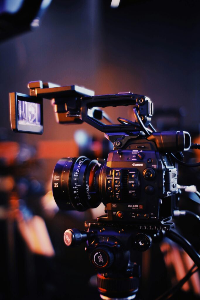 pexels-photo-2873486-2873486 Close-up of a professional video camera setup indoors, capturing high-quality footage.